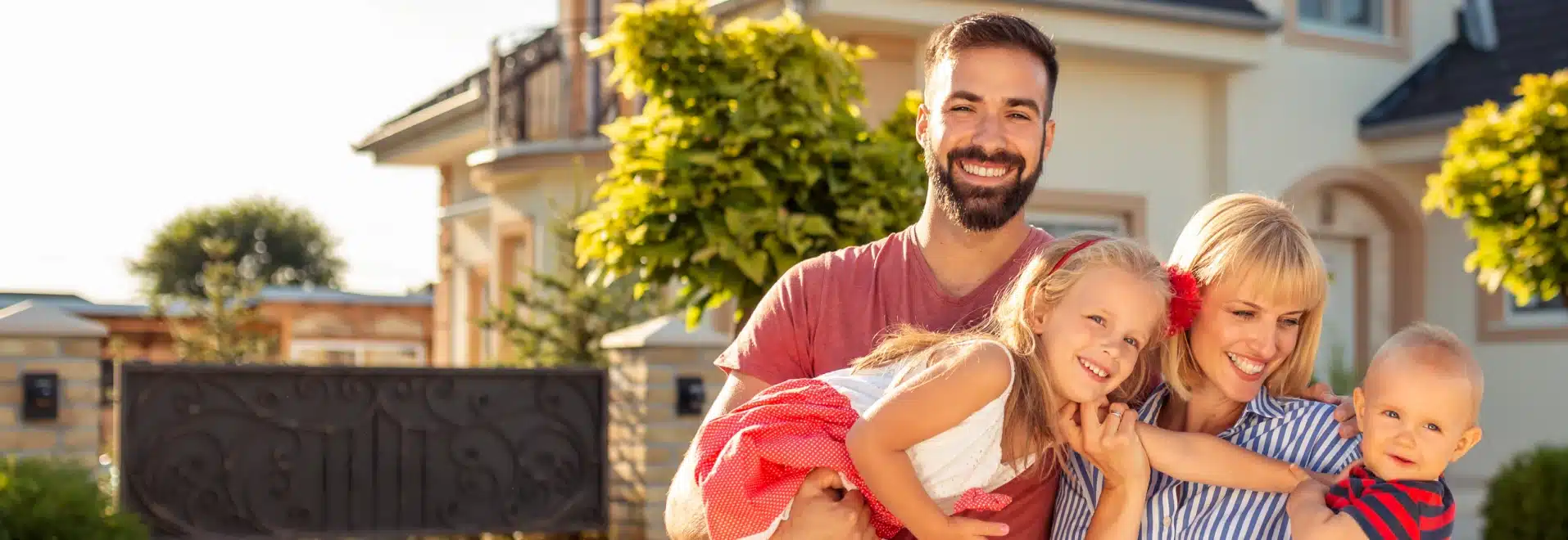 family standing in front of their new house 2023 11 27 05 19 48